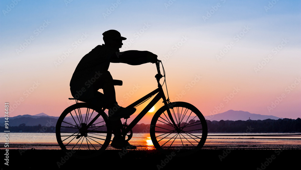 People cycling at beach People cycling at beach