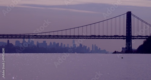 The George Washington Bridge connects New Jersey to New York state with the Manhattan skyline. photo