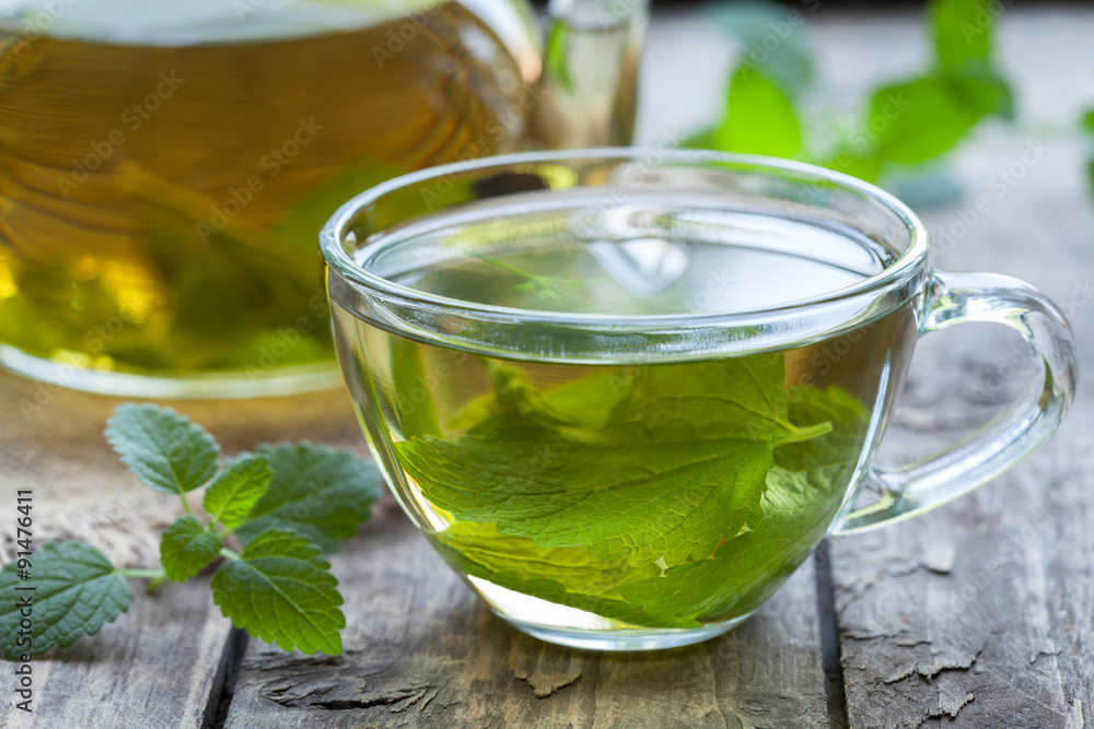 Fresh natural green melissa herbal tea in glass cup. Organic Fresh natural green melissa herbal tea in glass cup. Organic