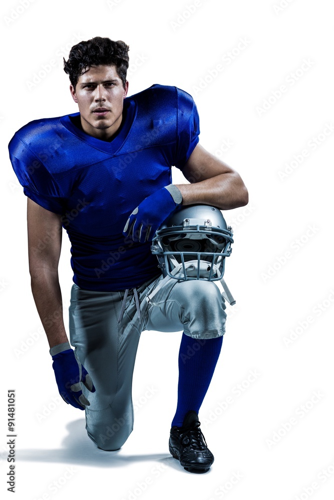 Portrait of serious sportsman holding helmet Portrait of serious sportsman holding helmet