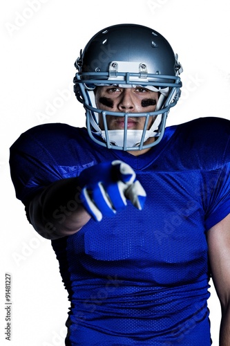 Portrait of American football player pointing