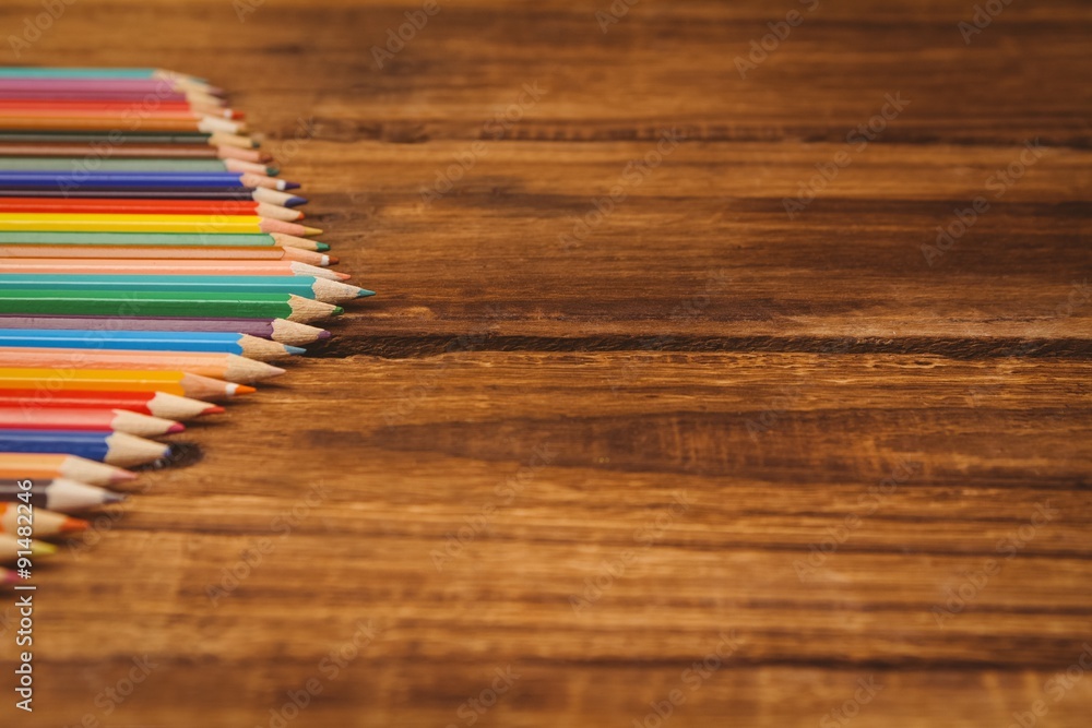 Obraz premium Colour pencils on desk with copy space