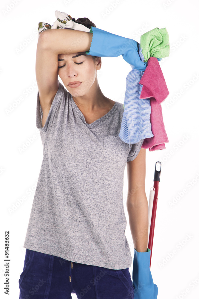 Tired frustrated and exhausted cleaning woman isolated on white Tired frustrated and exhausted cleaning woman isolated on white