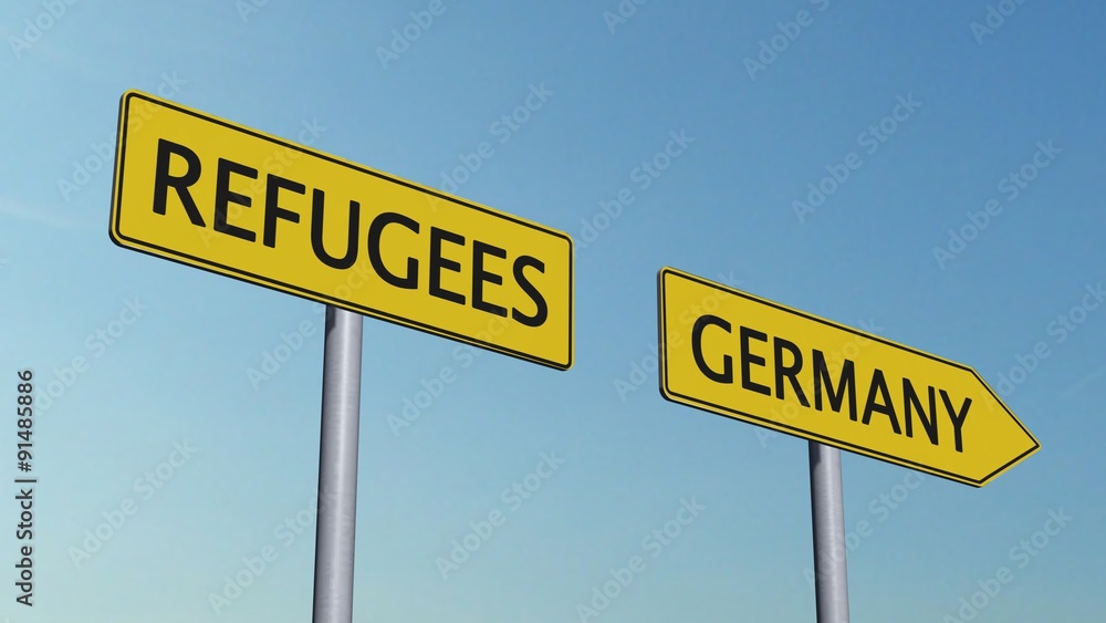 Refugees / Germany Signpost on sky background Refugees / Germany Signpost on sky background