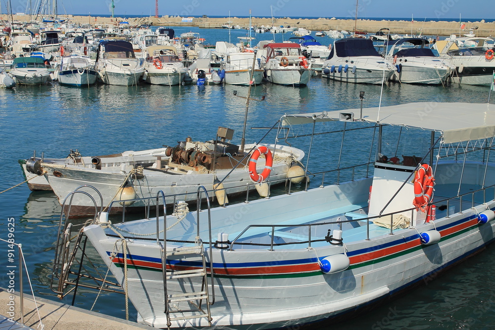 Fishing and passenger boats in the port of Numana, Italy 