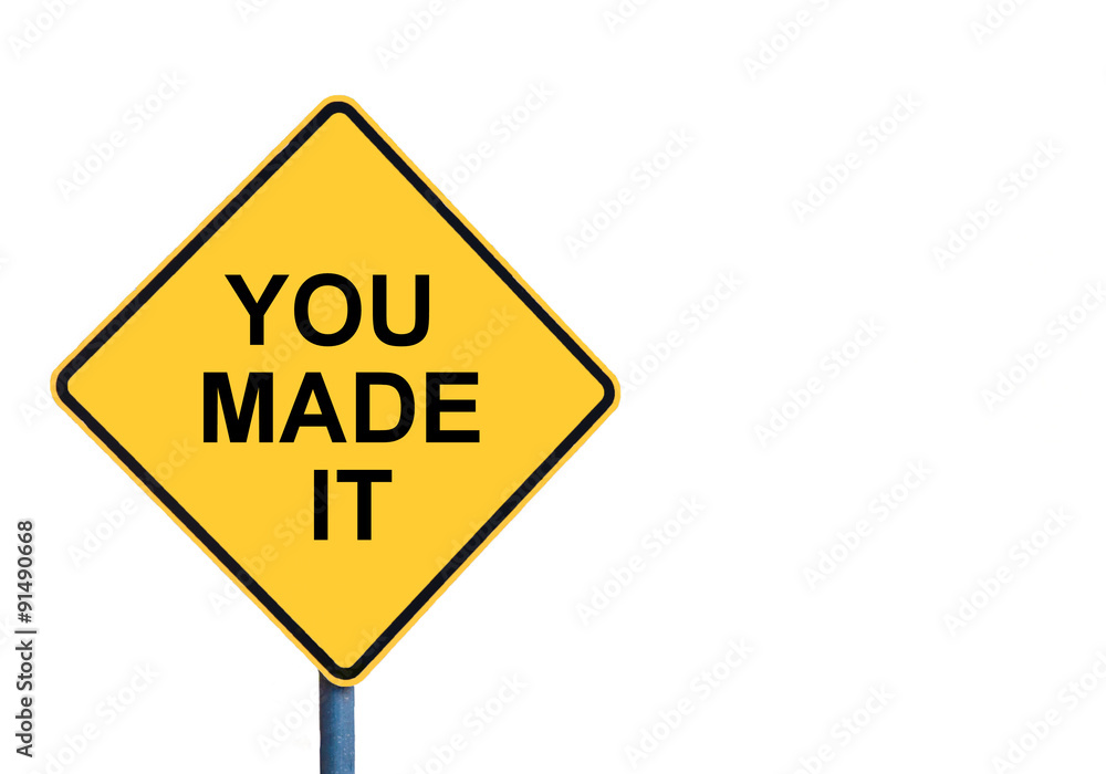 Yellow roadsign with YOU MADE IT message Yellow roadsign with YOU MADE IT message