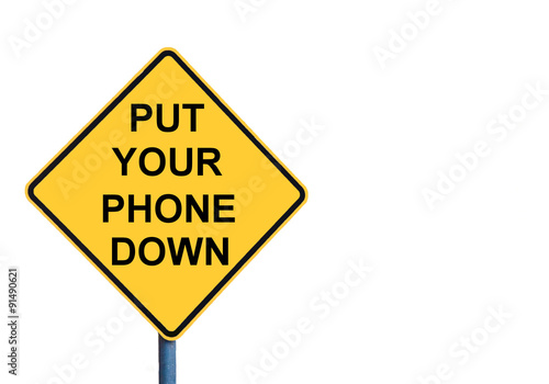 Obraz na płótnie Yellow roadsign with PUT YOUR PHONE DOWN message w salonie
