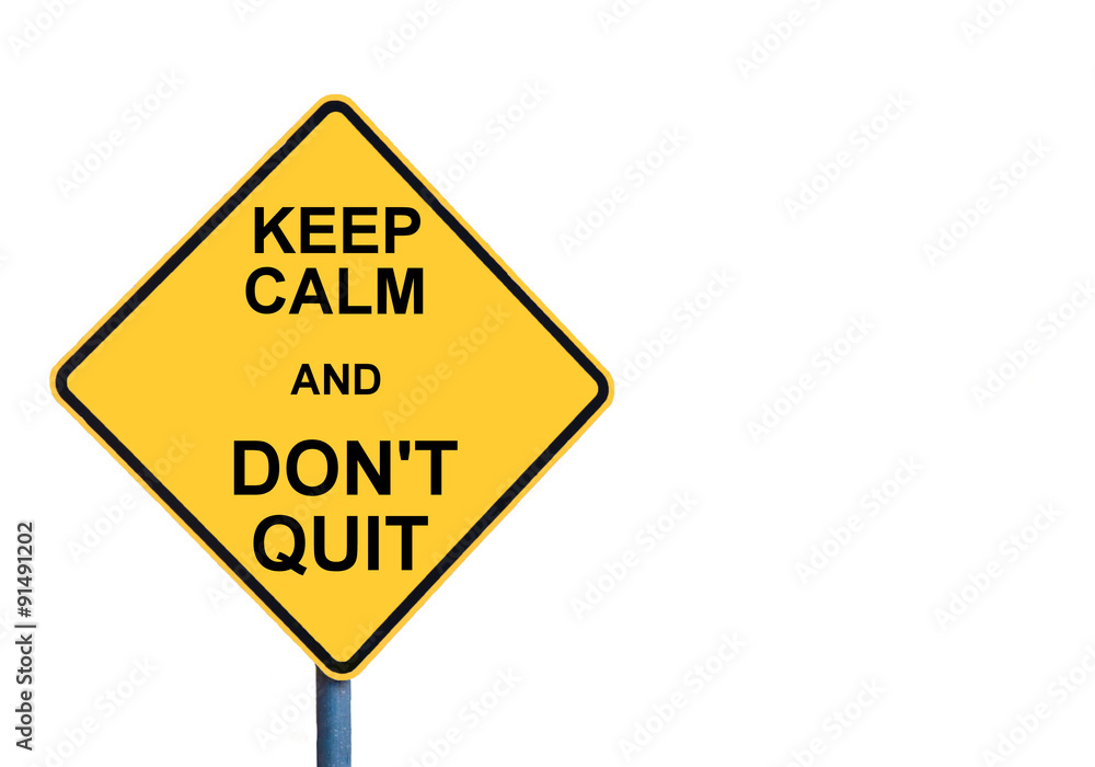 Yellow roadsign with KEEP CALM AND DON'T QUIT message Yellow roadsign with KEEP CALM AND DON'T QUIT message