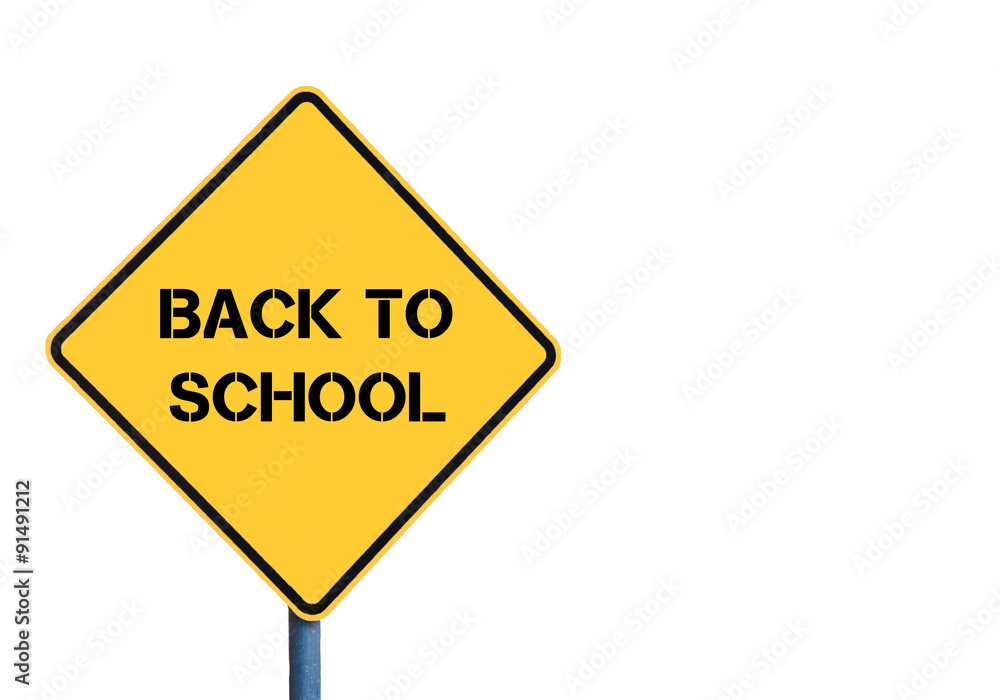 Yellow roadsign with BACK TO SCHOOL message Yellow roadsign with BACK TO SCHOOL message
