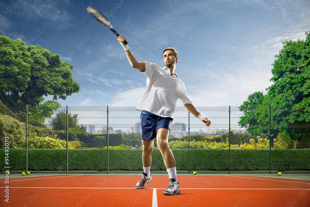 Young man is playing tennis
