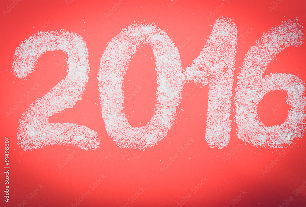 Sugar in the form of numbers 2016 red paper background. Christma Sugar in the form of numbers 2016 red paper background. Christma