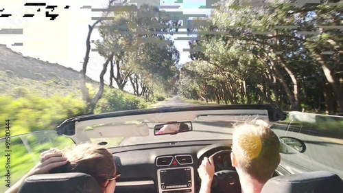 Couple driving convertible car cabriolet cape town south africa steadicam shot photo