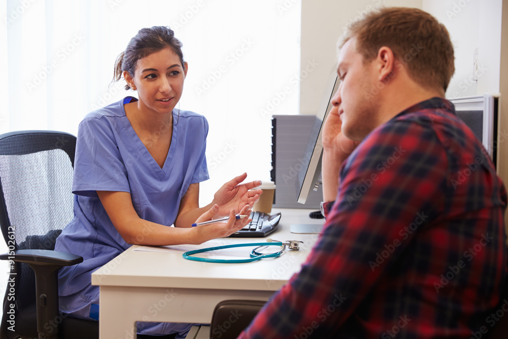 Fototapeta premium Female Doctor Treating Patient Suffering With Depression