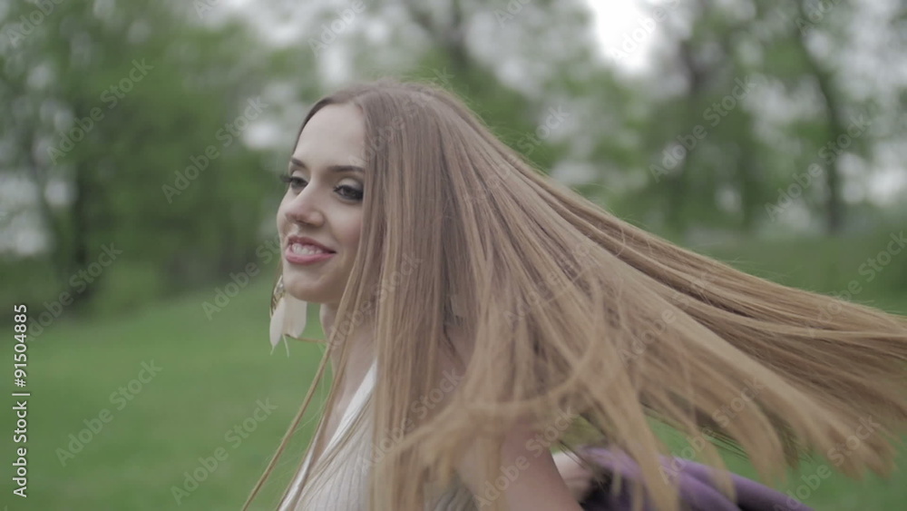 Happy young woman having fun outdoor. Beauty girl in white dress Happy young woman having fun outdoor. Beauty girl in white dress
