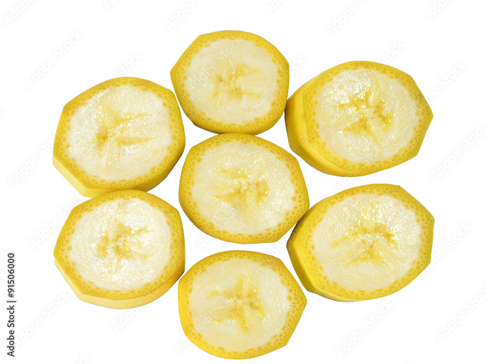 Banana isolated on white background with clipping path. Closeup. Slices of banana in the form of the sun. Banana isolated on white background with clipping path. Closeup. Slices of banana in the form of the sun.