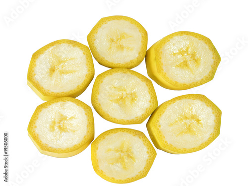 Banana isolated on white background with clipping path. Closeup. Slices of banana in the form of the sun.