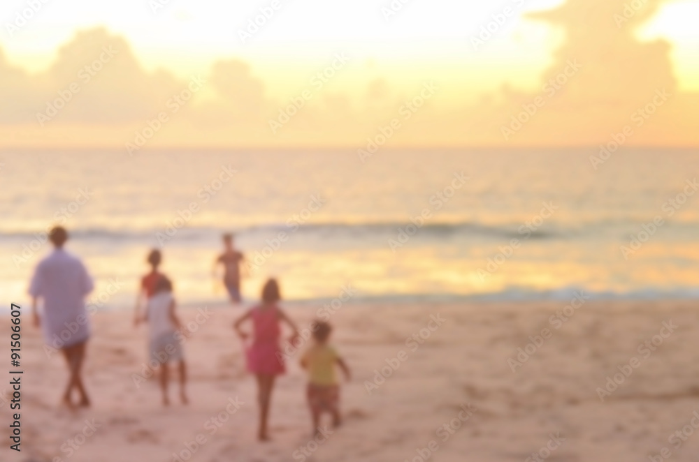 Blurred kid on beach abstract background.