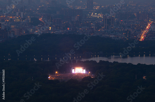 View of Central park with a musical concert in New York City photo