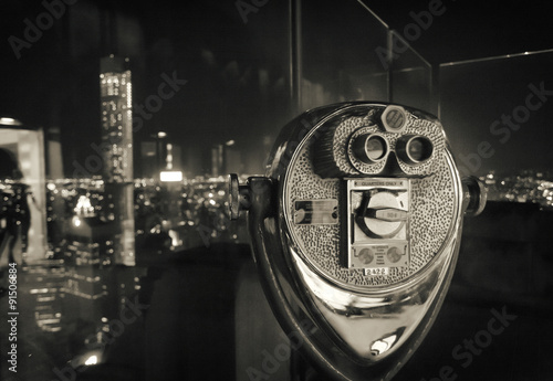 Binocular in New York City, image in grunge and retro style.