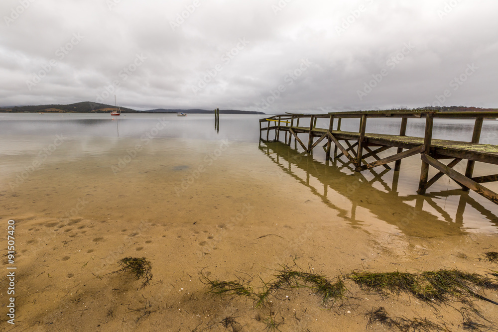 Wooden pier reflects