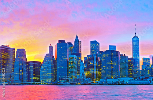 New York CIty, Manhattan famous landmark buildings of financial district at colorful sunset #91512023