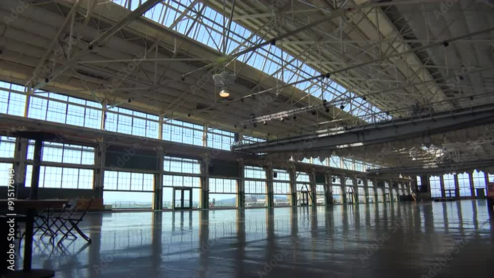 Interior of an empty warehouse, factory or showroom. Interior of an empty warehouse, factory or showroom.