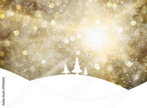 Magical gold colored sky with realistic heavy snowfall and sparkle, Christmas and New Years Holiday winter landscape scene with trees on hills. Illustration greeting card with copy space background.