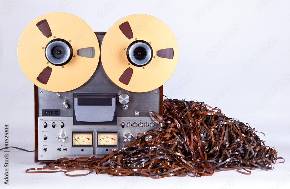 Open Reel Tape Deck Recorder Player with Messy Entangled Tape Stock Photo