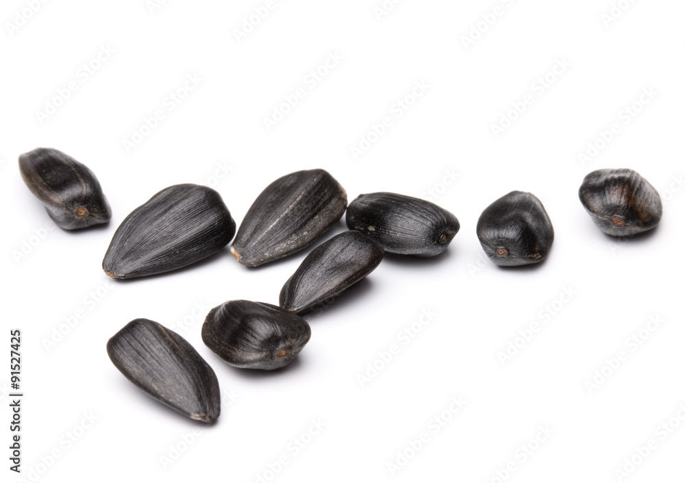 Sunflower seeds isolated on white background close up Sunflower seeds isolated on white background close up