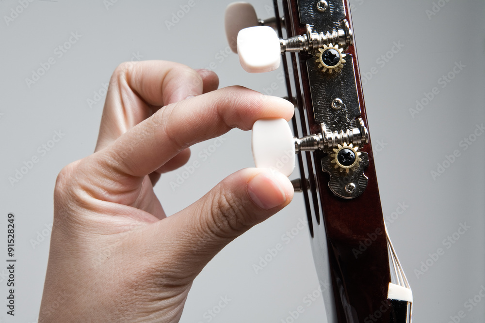 Fototapeta premium tuning guitar