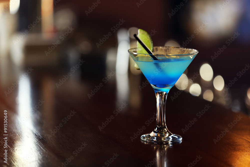 Cocktail on bar counter on bar background Cocktail on bar counter on bar background