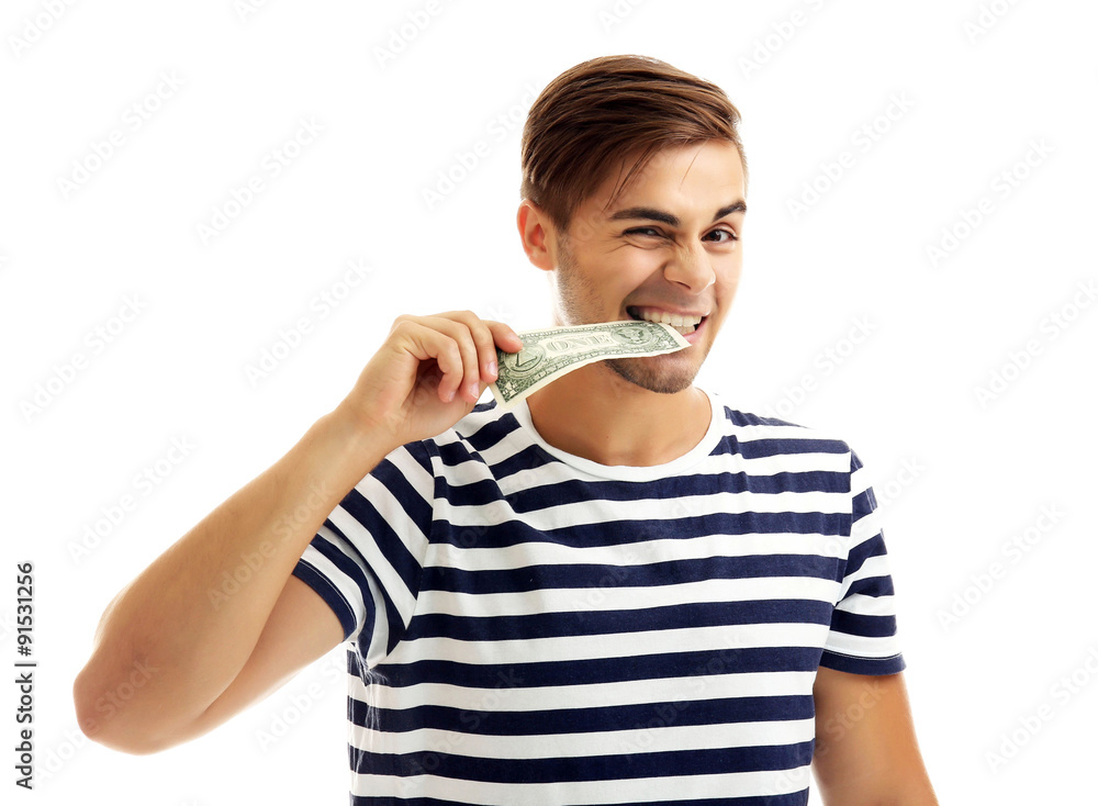 Handsome young man holding money isolated on white Handsome young man holding money isolated on white