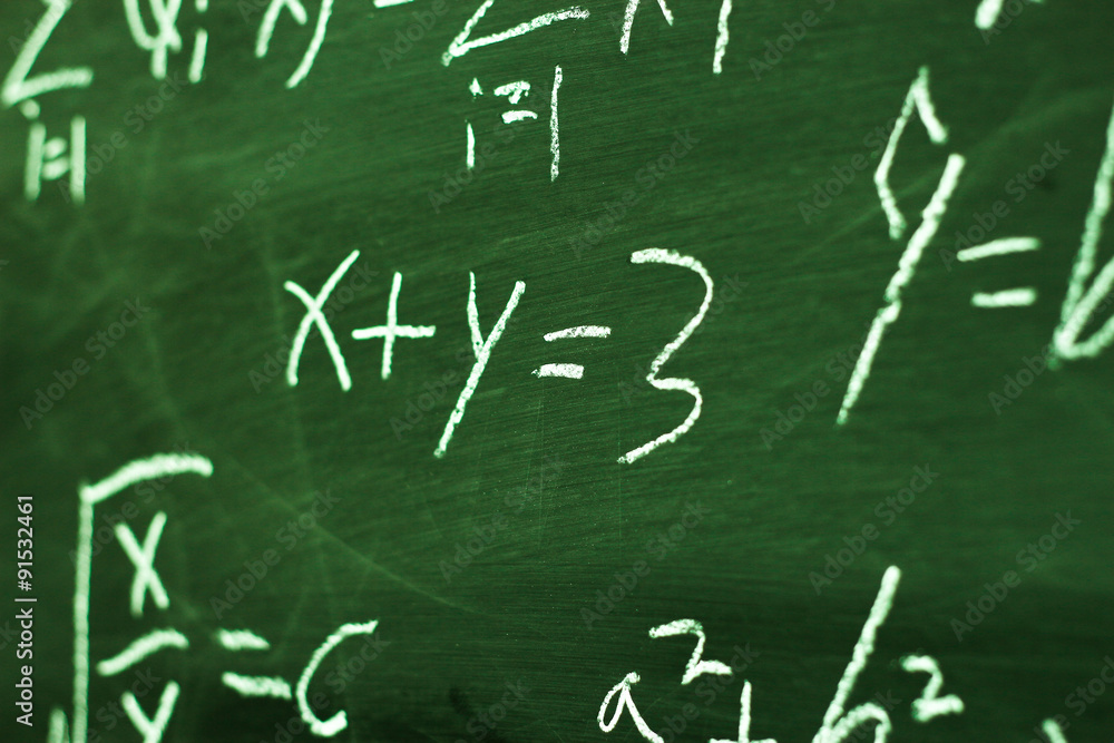 Maths formulas on chalkboard background Maths formulas on chalkboard background