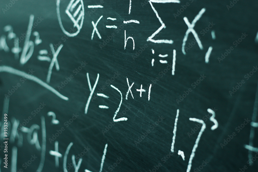 Maths formulas on chalkboard background Maths formulas on chalkboard background