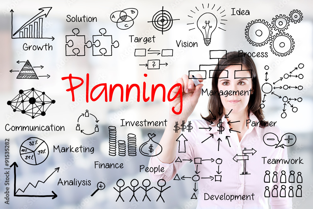 Young business woman writing planning concept. Office background. Young business woman writing planning concept. Office background.