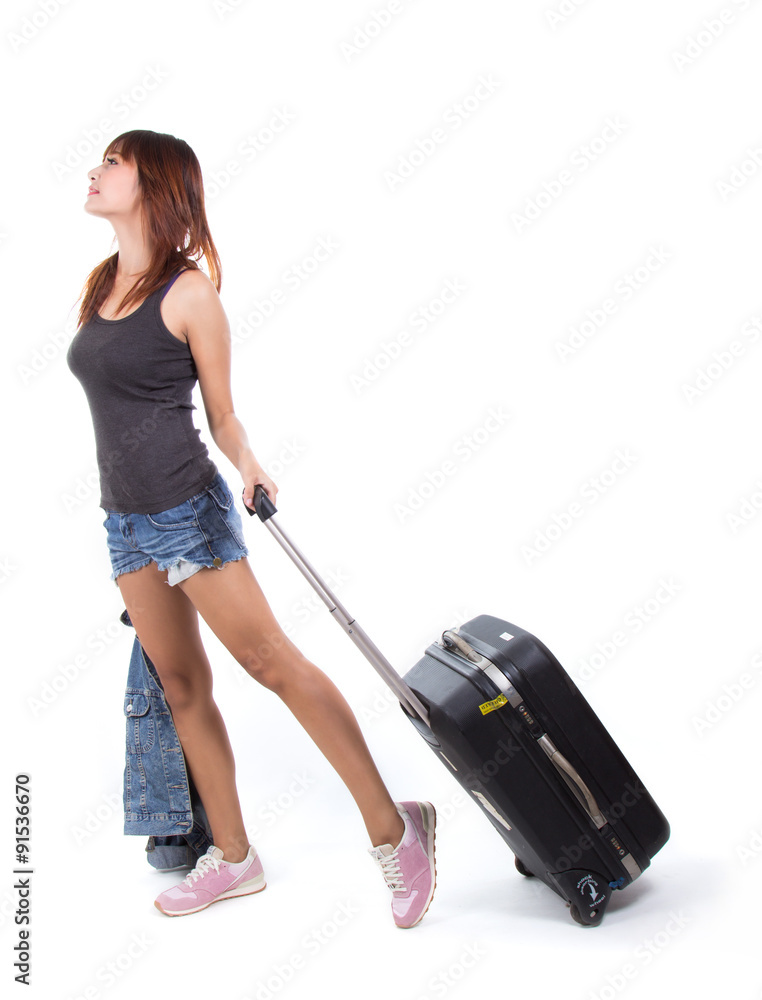 Woman traveller with suitcase isolated on white Woman traveller with suitcase isolated on white