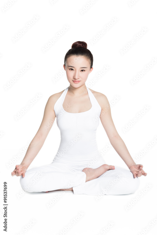 people sitting in lotus position during yoga class people sitting in lotus position during yoga class