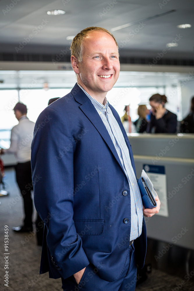 Fototapeta premium Businessman happy to travel by plane