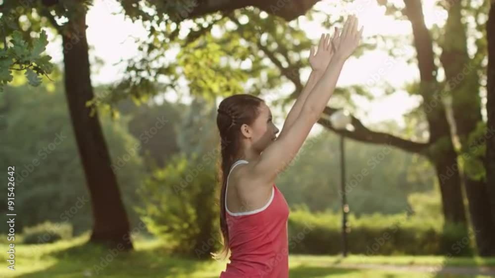 Pretty Girl is doing Yoga in Park. Jib Shot. Pretty Girl is doing Yoga in Park. Jib Shot.