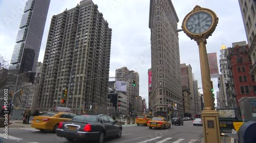 Traffic passing in front of New York's iconic Flatiron Building.