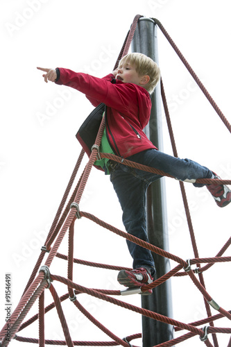 boy climbing on playground