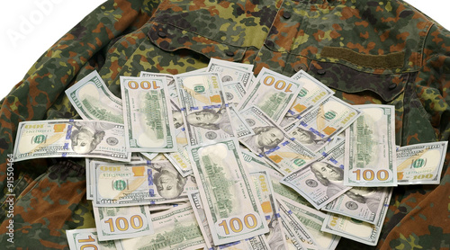One hundred dollar bills on a military uniform