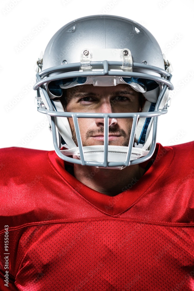Confident American football player in red jersey Confident American football player in red jersey