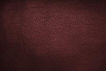 Red leather texture closeup, useful as background