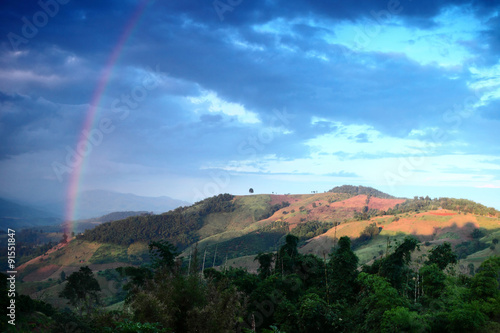 Beautiful rainbow across Mountain thailand.