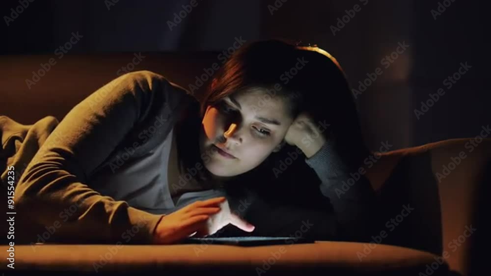 woman using tablet computer online shopping at home woman using tablet computer online shopping at home