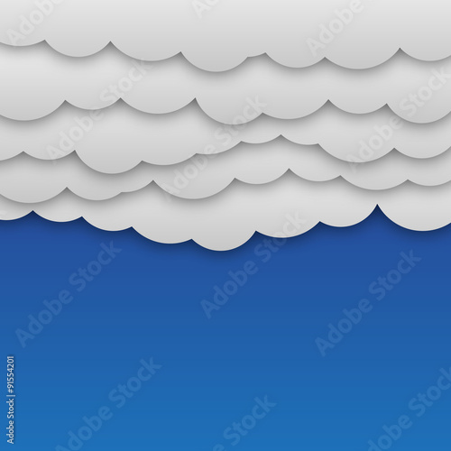White paper clouds at blue background