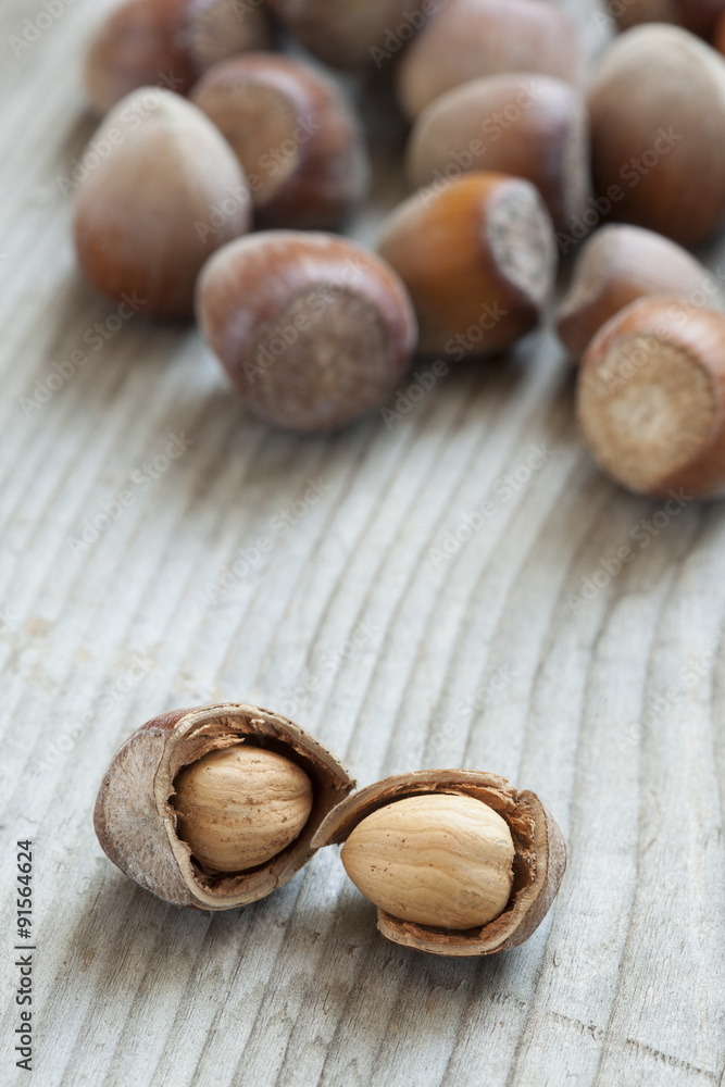 Hazelnuts on old wooden background Hazelnuts on old wooden background