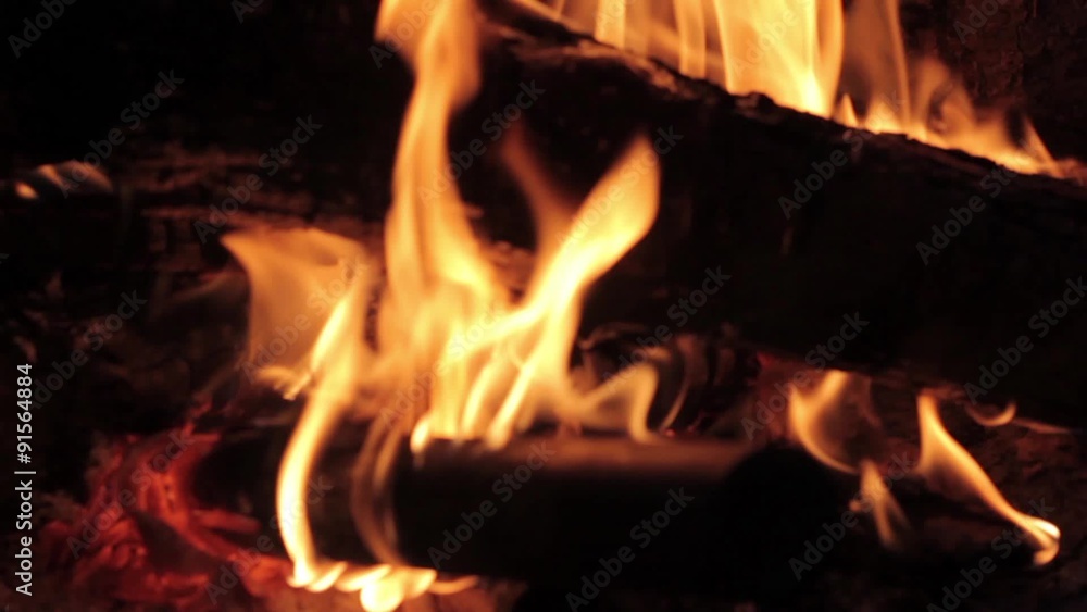 closeup flames of a campfire in the night closeup flames of a campfire in the night