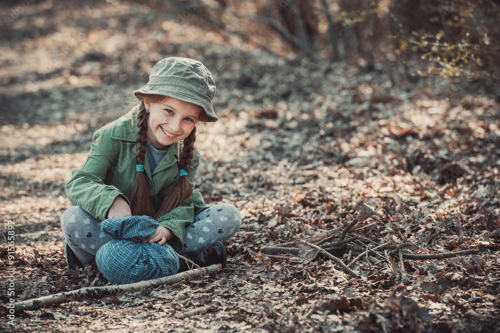 little girl playing in the woods, little girl playing in the woods,